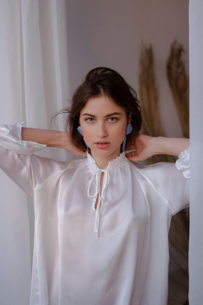 Modern laser-cut silk blouse for women with hidden closures 2026