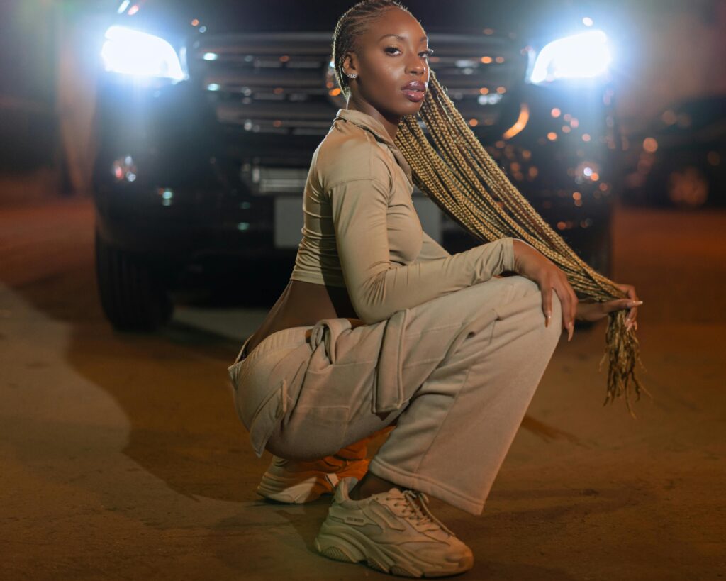 Women's beige chunky dad shoes in warm sand tone styled with matching cargo pants streetwear fashion 2026