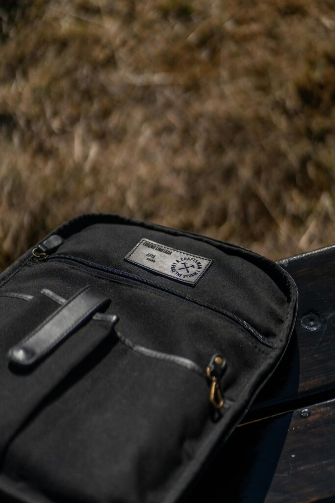 Sleek crossbody tech pouch for men with RFID blocking 2026